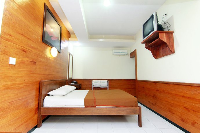 Imagen de la habitación del Hotel The Soemarsono, Depok. Foto 13