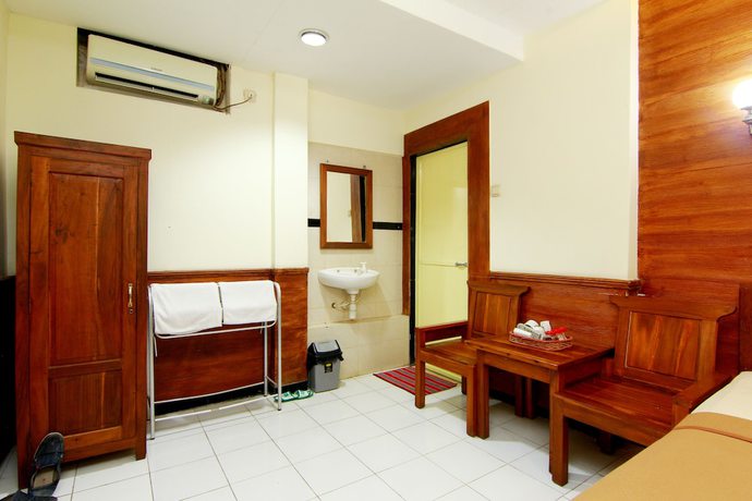 Imagen de la habitación del Hotel The Soemarsono, Depok. Foto 14