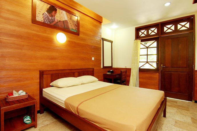Imagen de la habitación del Hotel The Soemarsono, Depok. Foto 15