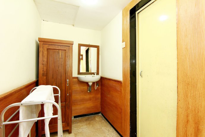 Imagen de la habitación del Hotel The Soemarsono, Depok. Foto 16
