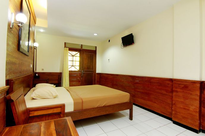 Imagen de la habitación del Hotel The Soemarsono, Depok. Foto 17