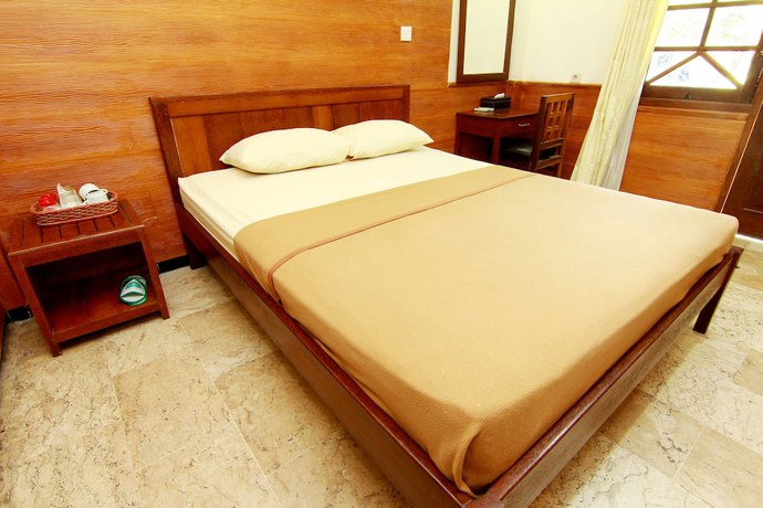 Imagen de la habitación del Hotel The Soemarsono, Depok. Foto 18