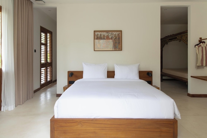 Imagen de la habitación del Hotel The Soko Bali. Foto 3
