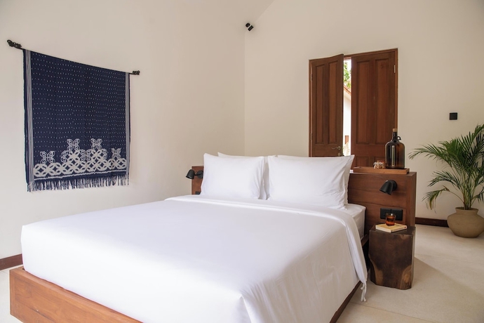 Imagen de la habitación del Hotel The Soko Bali. Foto 5