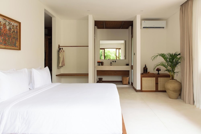 Imagen de la habitación del Hotel The Soko Bali. Foto 6
