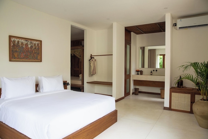 Imagen de la habitación del Hotel The Soko Bali. Foto 7