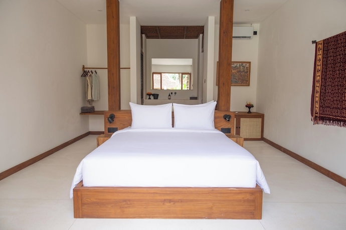 Imagen de la habitación del Hotel The Soko Bali. Foto 8