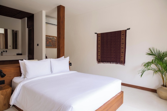 Imagen de la habitación del Hotel The Soko Bali. Foto 9