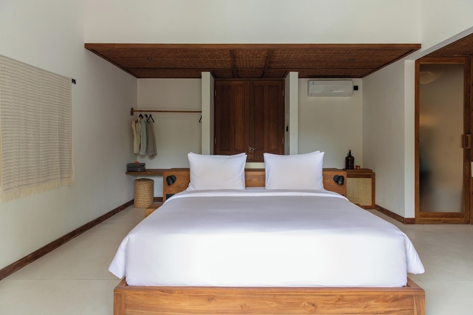 Imagen de la habitación del Hotel The Soko Bali. Foto 10