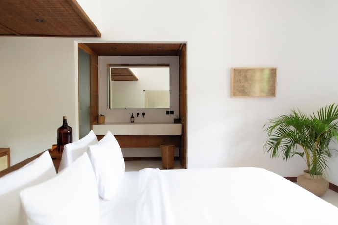 Imagen de la habitación del Hotel The Soko Bali. Foto 11
