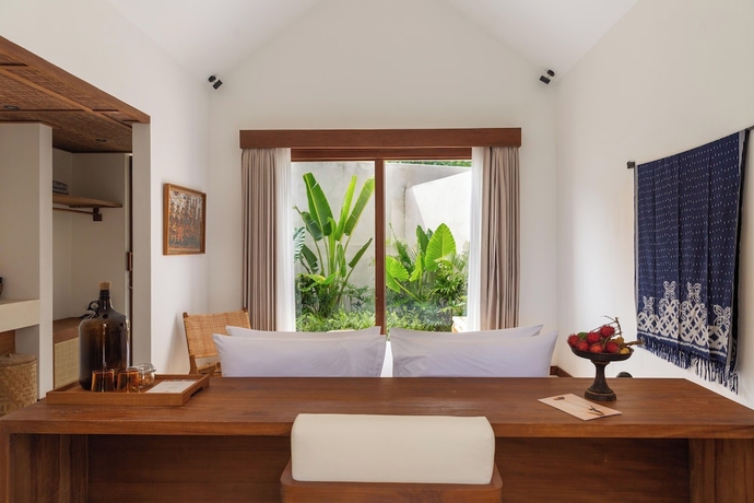 Imagen de la habitación del Hotel The Soko Bali. Foto 13