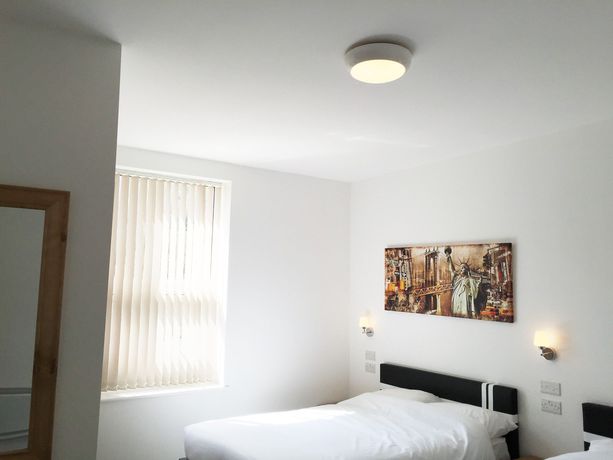 Imagen de la habitación del Hotel The Solar Strand. Foto 11