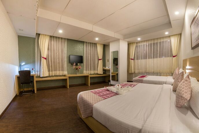 Imagen de la habitación del Hotel The Solitaire Express. Foto 16