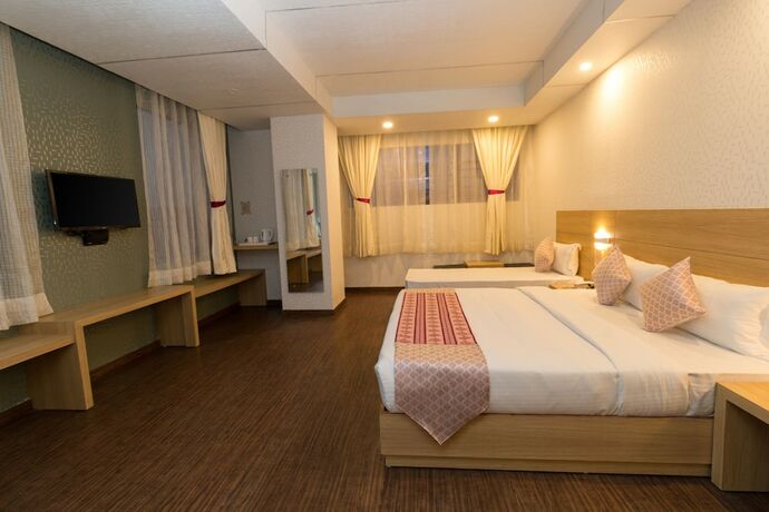 Imagen de la habitación del Hotel The Solitaire Express. Foto 18