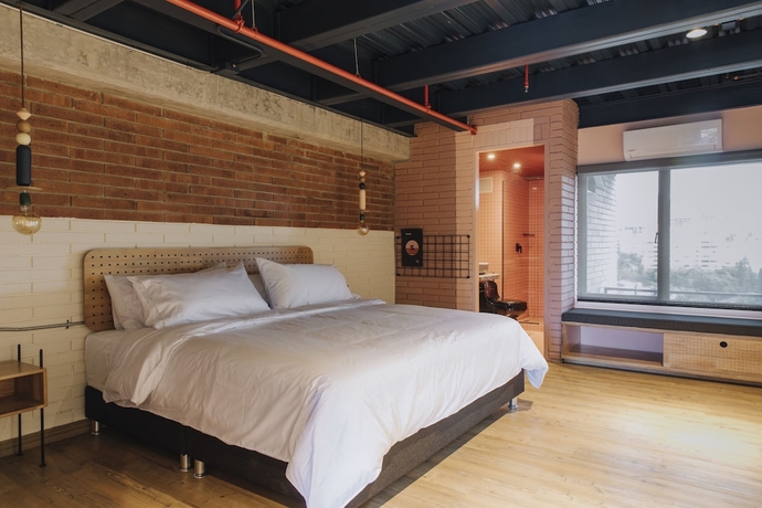 Imagen de la habitación del Hotel The Somos Beats and Rooftop. Foto 10