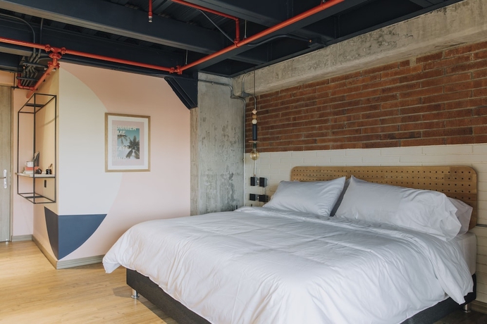 Imagen de la habitación del Hotel The Somos Beats and Rooftop. Foto 11