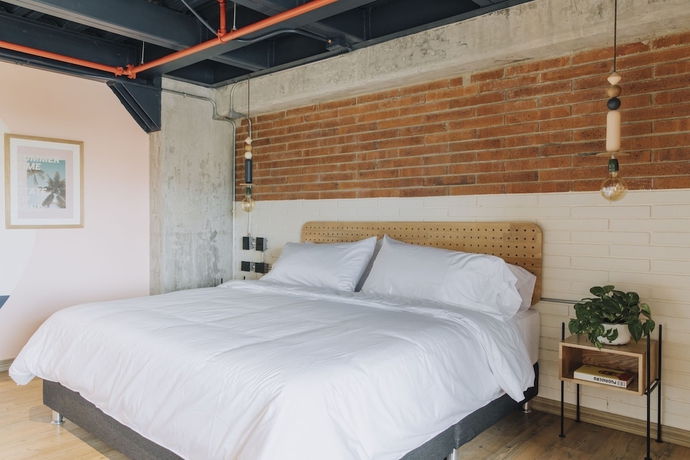 Imagen de la habitación del Hotel The Somos Beats and Rooftop. Foto 12
