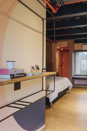Imagen de la habitación del Hotel The Somos Beats and Rooftop. Foto 13