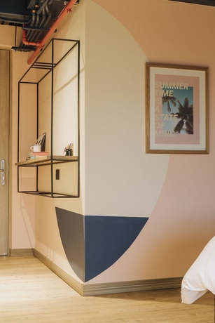 Imagen de la habitación del Hotel The Somos Beats and Rooftop. Foto 14