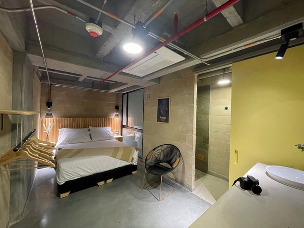 Imagen de la habitación del Hotel The Somos S. Foto 2
