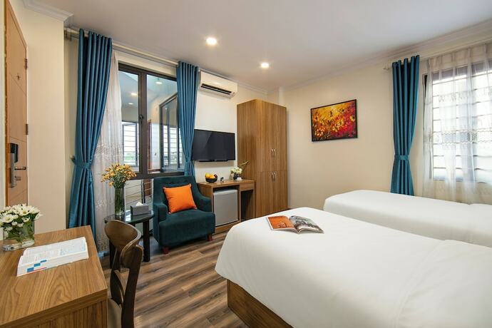 Imagen de la habitación del Hotel The Sono Hanoi. Foto 11