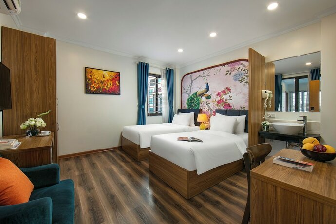 Imagen de la habitación del Hotel The Sono Hanoi. Foto 12
