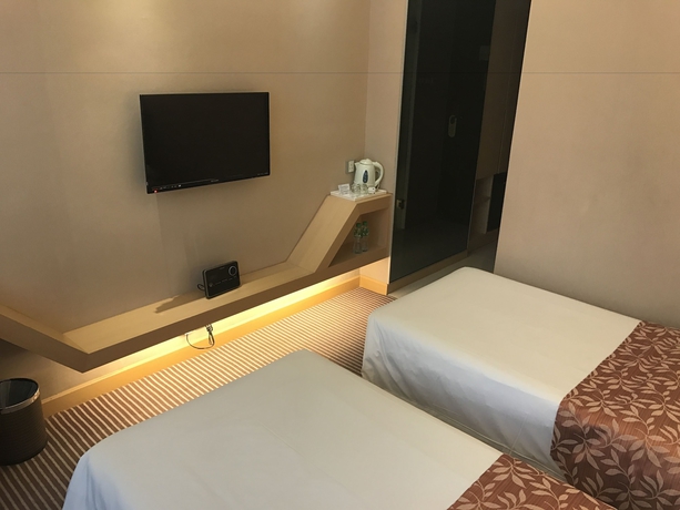 Imagen de la habitación del Hotel The South China. Foto 4