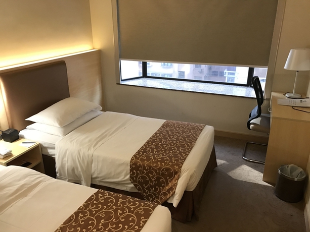 Imagen de la habitación del Hotel The South China. Foto 5