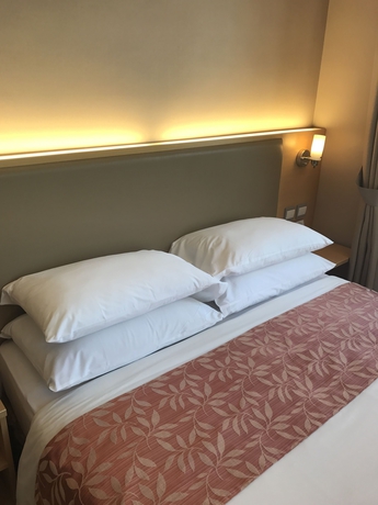 Imagen de la habitación del Hotel The South China. Foto 10