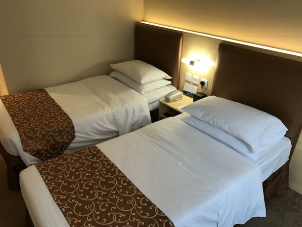 Imagen de la habitación del Hotel The South China. Foto 15