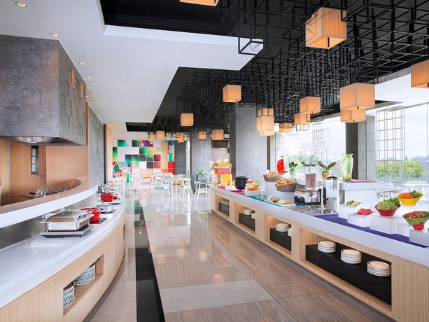 Imagen del bar/restaurante del Hotel The Southern Hotel Surabaya. Foto 7