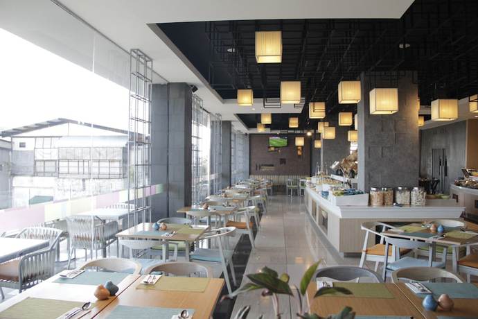 Imagen del bar/restaurante del Hotel The Southern Hotel Surabaya. Foto 8