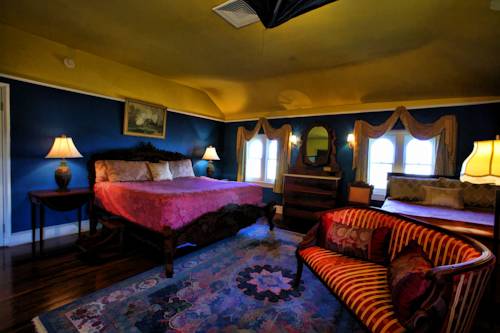 Imagen de la habitación del Hotel The Southern Mansion. Foto 11