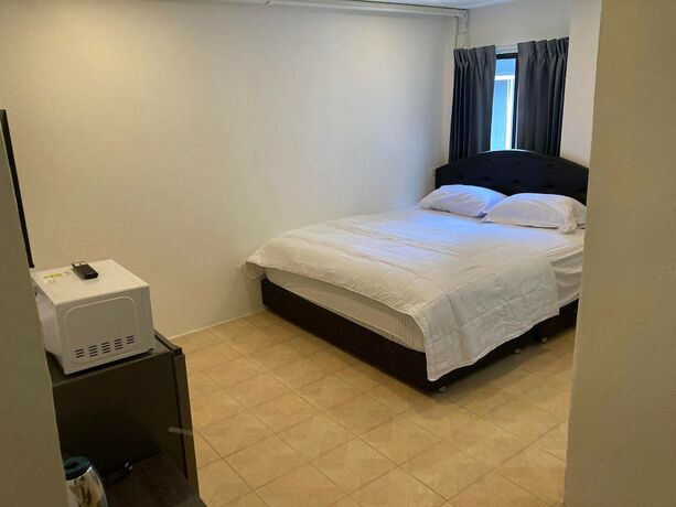 Imagen de la habitación del Hotel The Sports Lounge. Foto 15