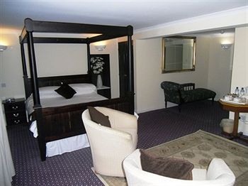 Imagen del bar/restaurante del Hotel The Sportsmans Inn Limited. Foto 2
