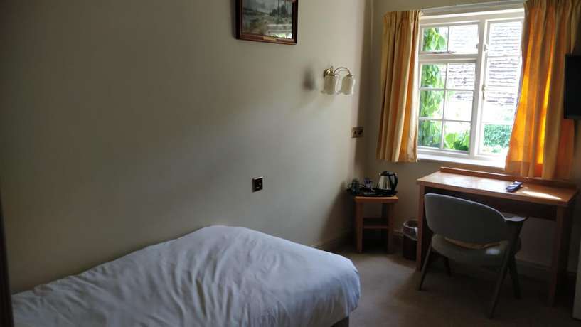 Imagen de la habitación del Hotel The Spread Eagle. Foto 13
