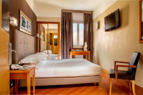 Imagen de la habitación del Hotel The Spring House Rome Vatican, Tapestry Collection by Hilton. Foto 8