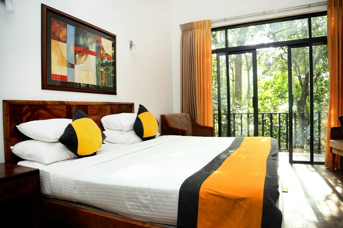 Imagen de la habitación del Hotel The Spring Villas. Foto 14