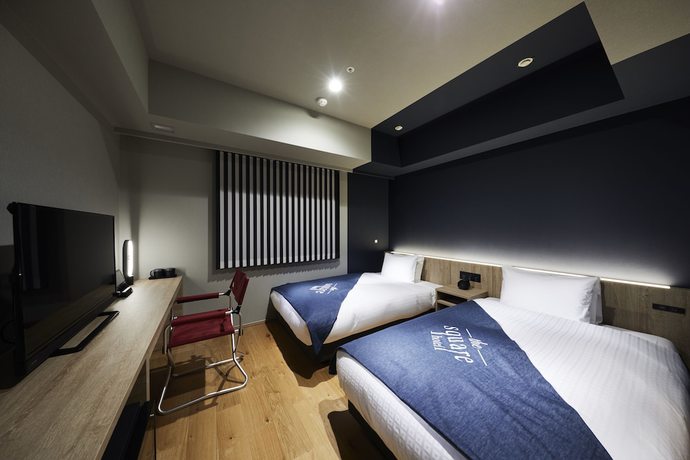 Imagen de la habitación del Hotel The Square Ginza. Foto 10