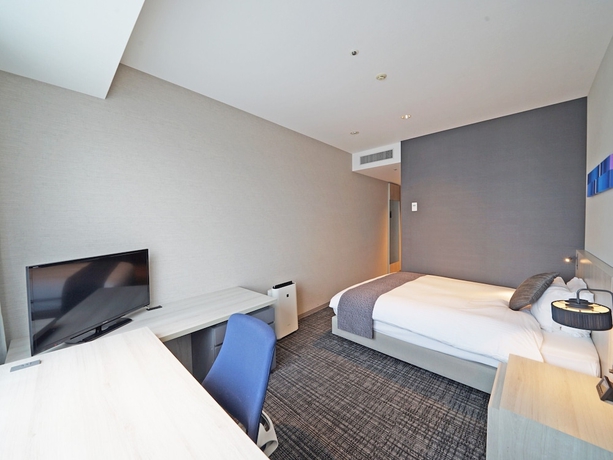 Imagen de la habitación del Hotel The Square Yokohama Minatomirai. Foto 11