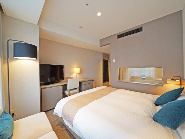 Imagen de la habitación del Hotel The Square Yokohama Minatomirai. Foto 14