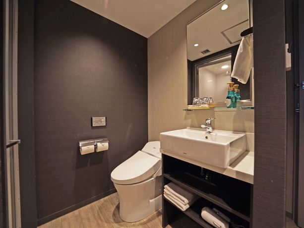 Imagen de la habitación del Hotel The Square Yokohama Minatomirai. Foto 16