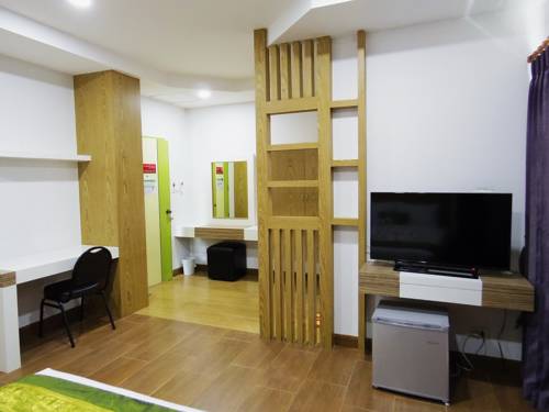 Imagen de la habitación del Hotel The Sr Residence Lampang. Foto 11