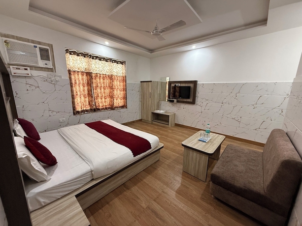 Imagen de la habitación del Hotel The Srishti Inn. Foto 10