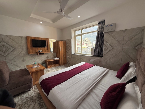 Imagen de la habitación del Hotel The Srishti Inn. Foto 11