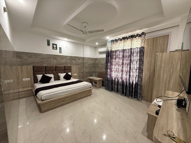 Imagen de la habitación del Hotel The Srishti Inn. Foto 12