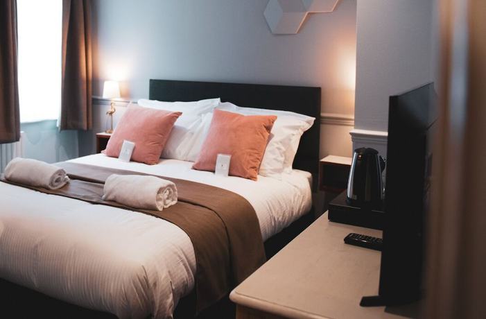 Imagen de la habitación del Hotel The Stag. Foto 10