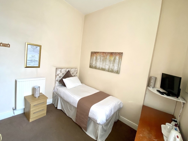 Imagen de la habitación del Hotel The Stalbridge Guest House. Foto 19