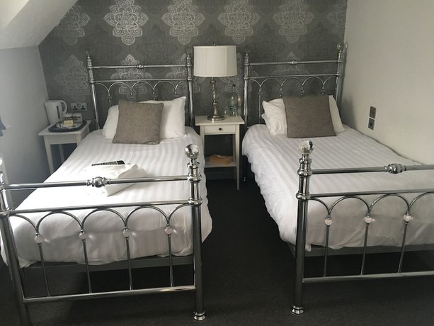 Imagen de la habitación del Hotel The Star. Foto 6