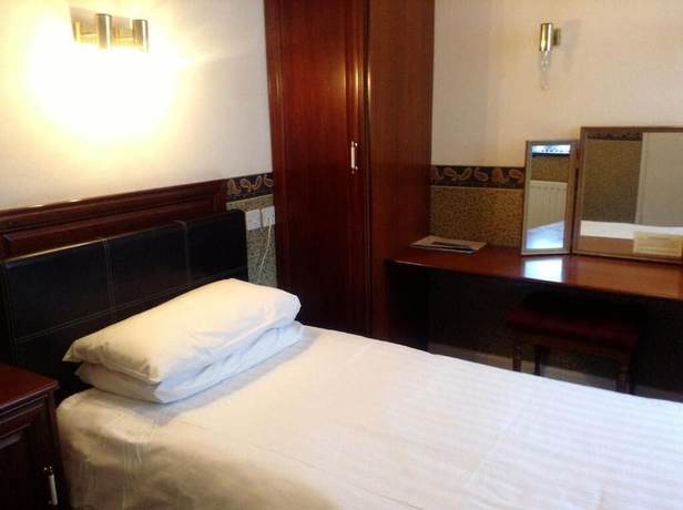 Imagen de la habitación del Hotel The Star. Foto 7